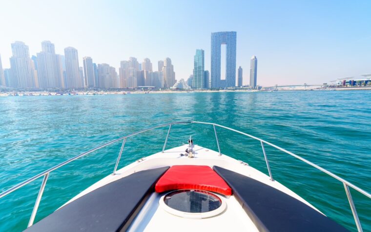 View over the bow towards the Dubai Marina skyline from the 31ft yacht