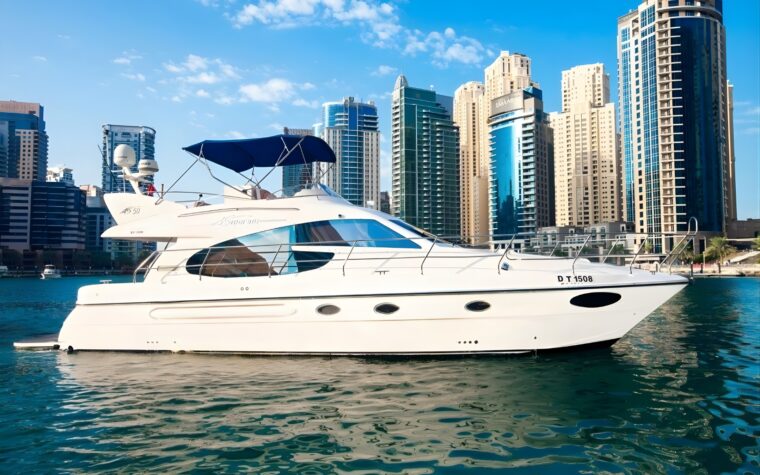 50ft private yacht in front of the Dubai Marina skyline towers