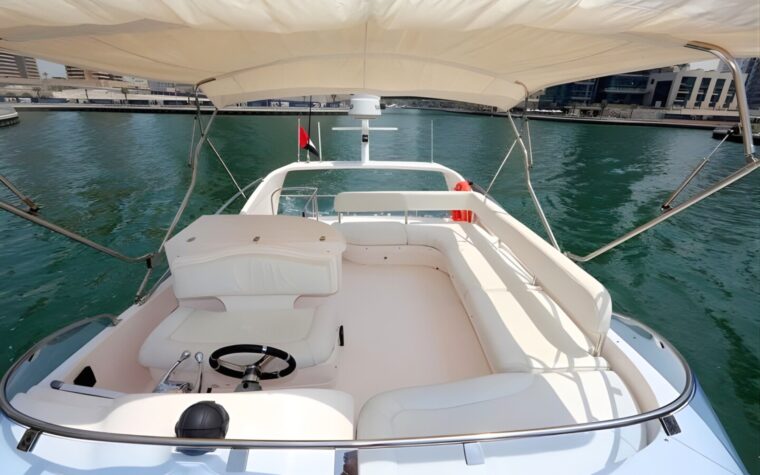 Flybridge helm and open-air seating on the upper deck of the 50ft yacht