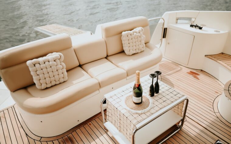 Shaded aft deck seating with a table aboard the 46ft yacht
