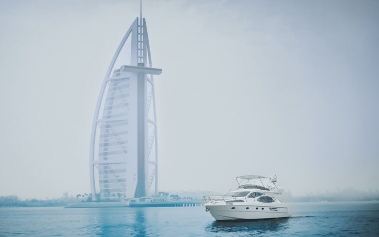 46ft private yacht on the water with the Burj Al Arab behind, Dubai