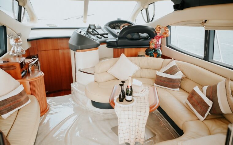 Air-conditioned saloon with cream seating aboard the 46ft yacht